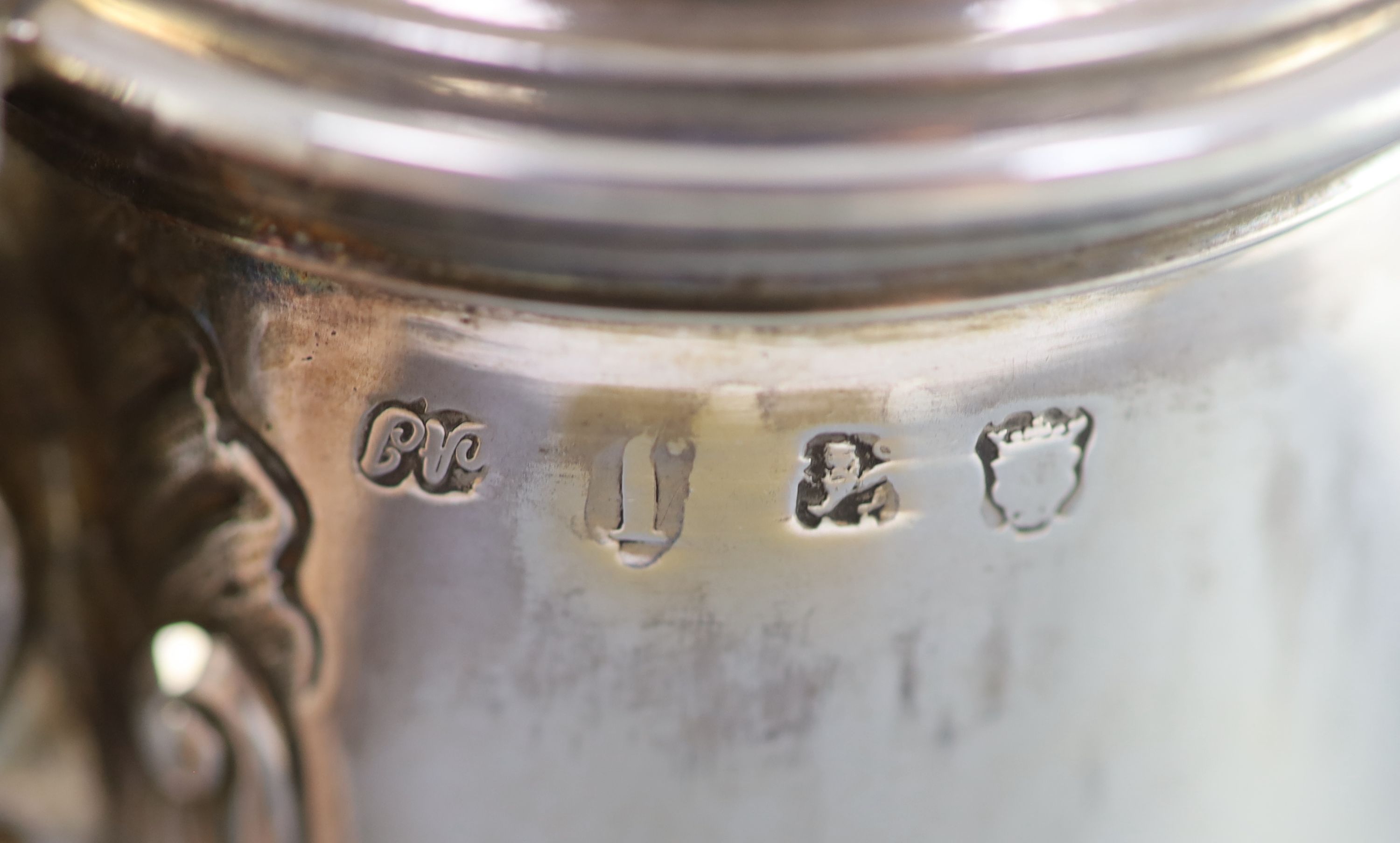 A George II silver coffee pot by Alexander Johnston